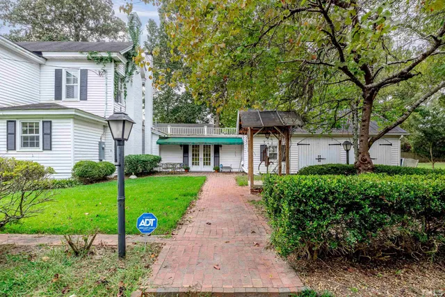 a front view of a house with a porch