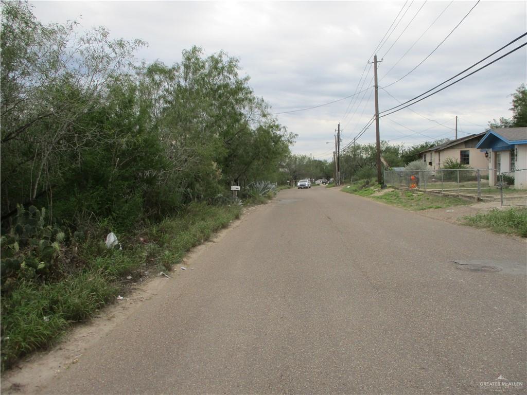 217 North Charco Blanco Road Rio Grande City, TX 78582 - Photo 2 of 4 a view of a road with a road sign on the side of the road