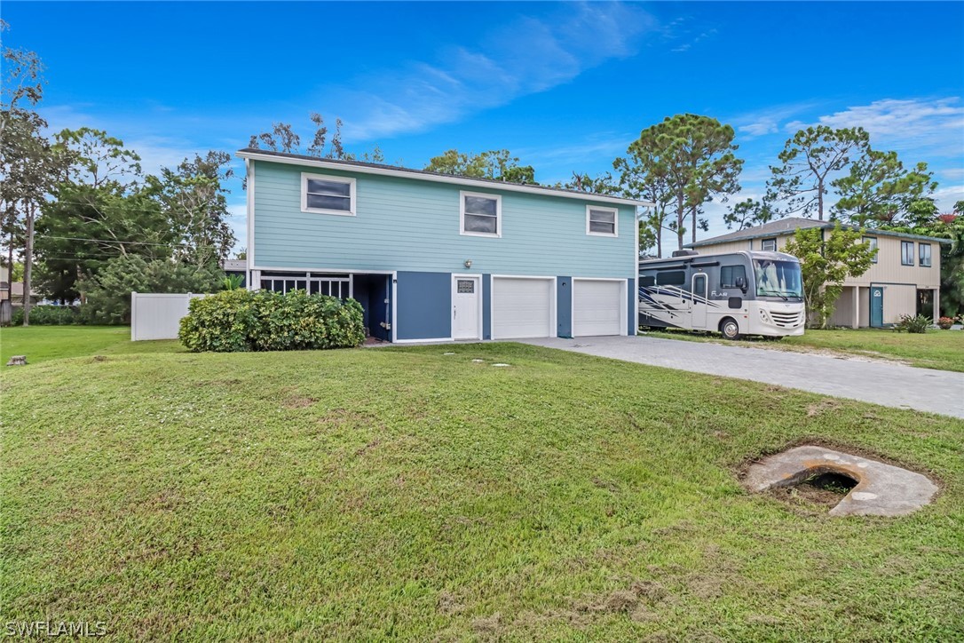 8454 Wren Road Fort Myers, FL 33967 - Photo 1 of 23 a house view with a garden space