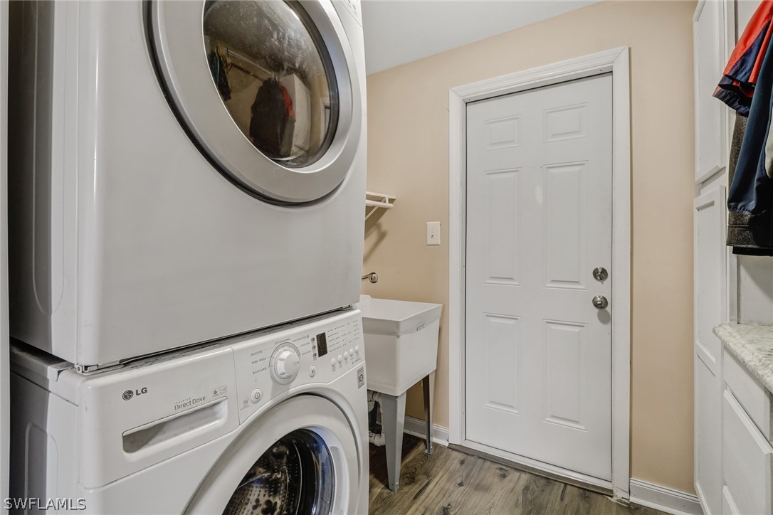 8454 Wren Road Fort Myers, FL 33967 - Photo 16 of 23 a utility room with dryer and washer