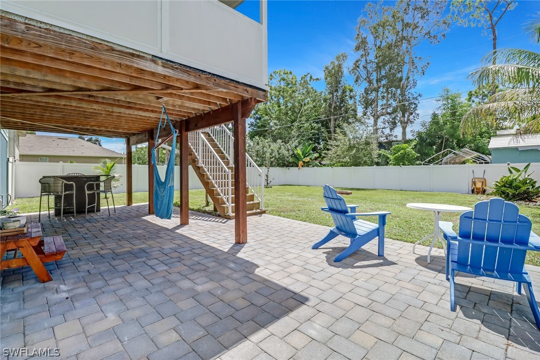 8454 Wren Road Fort Myers, FL 33967 - Photo 20 of 23 a view of a lounge chairs in the patio