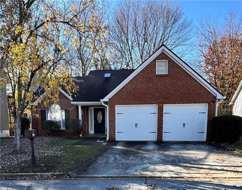 3138 Ozmer Landing Decatur, GA 30034 - Photo 1 of 1 a front view of a house with a yard