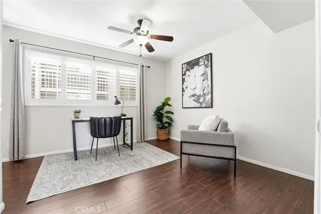 a view of a livingroom with furniture and wooden floor