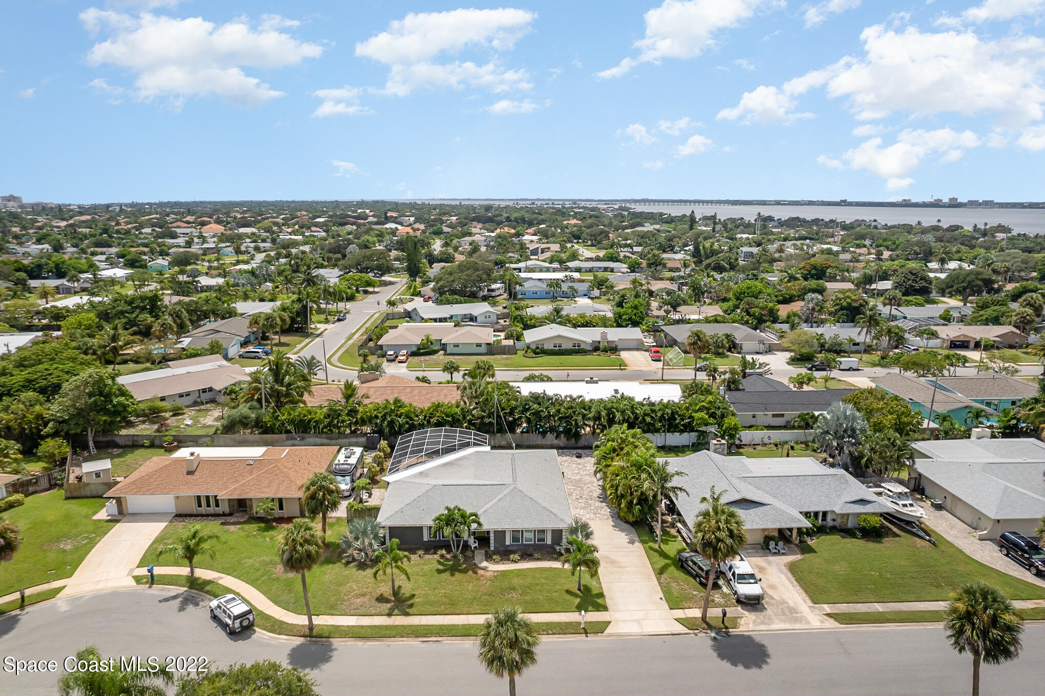 395 Rio Lane Indialantic, FL 32903 - Photo 1 of 40 an aerial view of residential houses with outdoor space