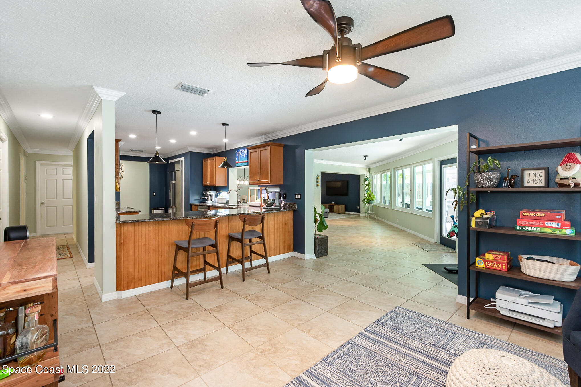 395 Rio Lane Indialantic, FL 32903 - Photo 19 of 40 a view of kitchen with furniture and a ceiling fan