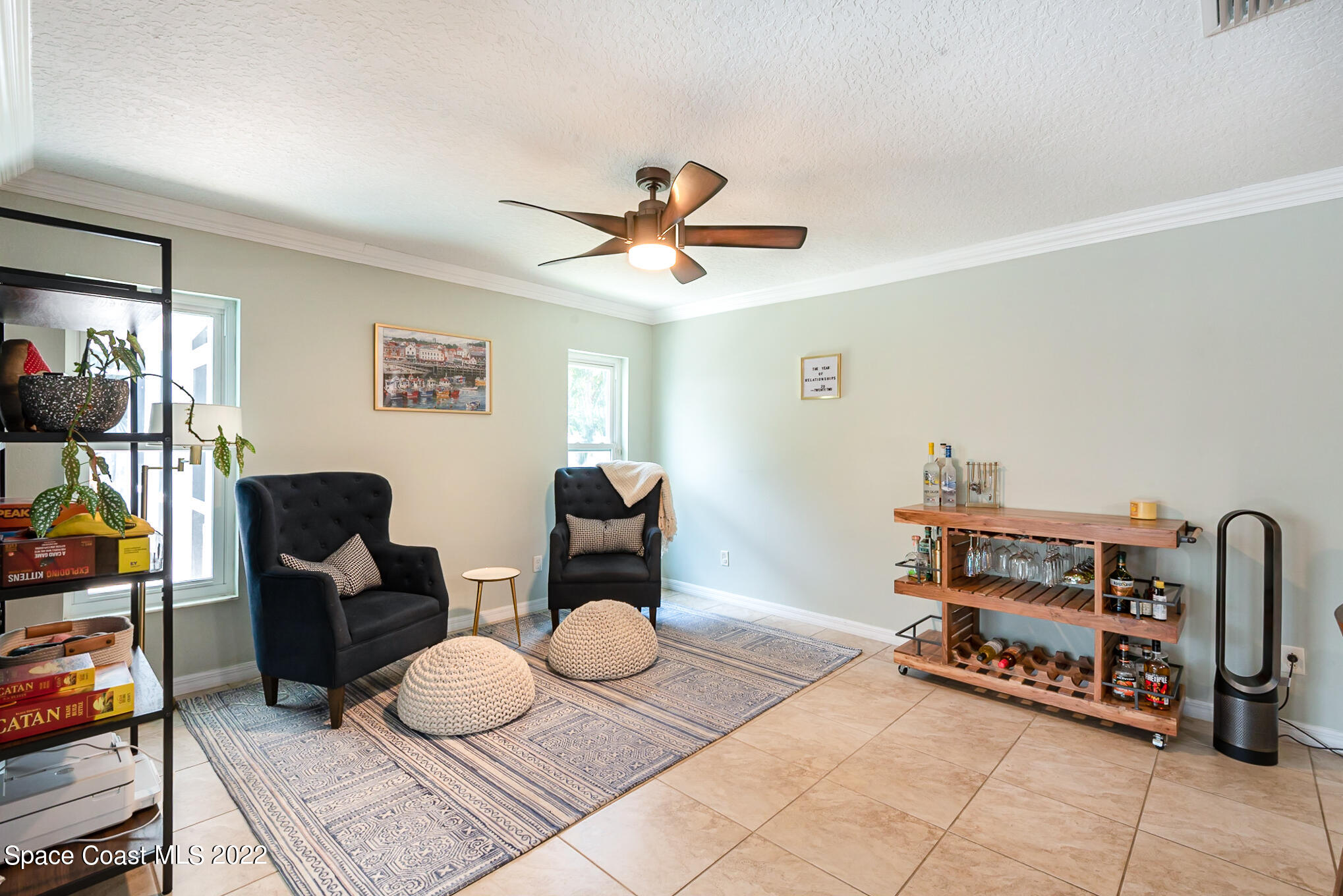 395 Rio Lane Indialantic, FL 32903 - Photo 20 of 40 a living room with furniture and a dining table