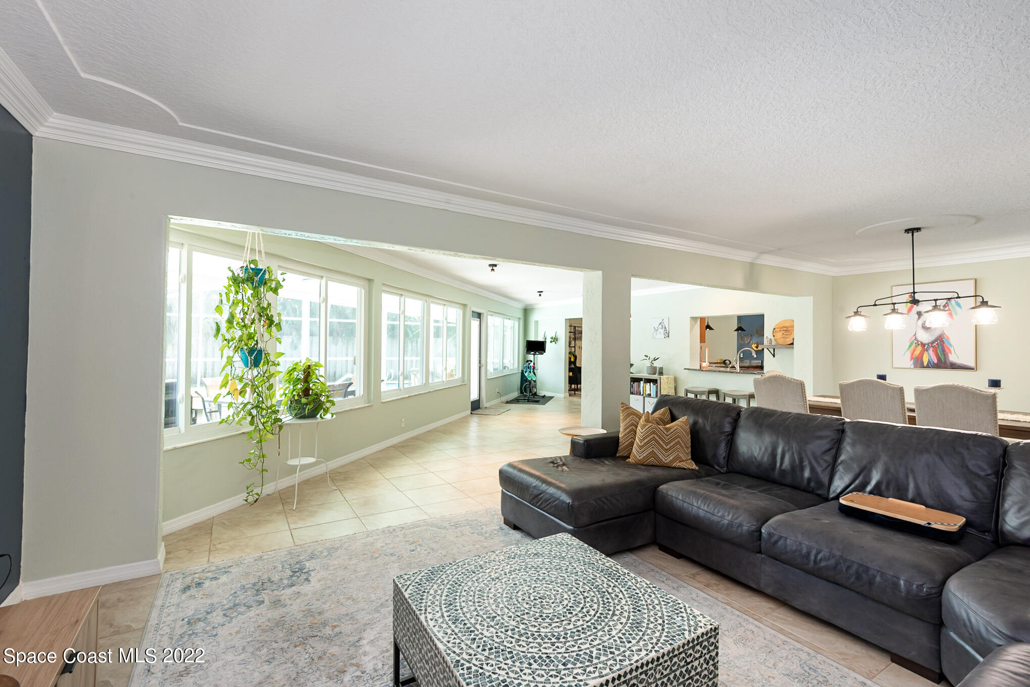 395 Rio Lane Indialantic, FL 32903 - Photo 23 of 40 a living room with furniture and a large window