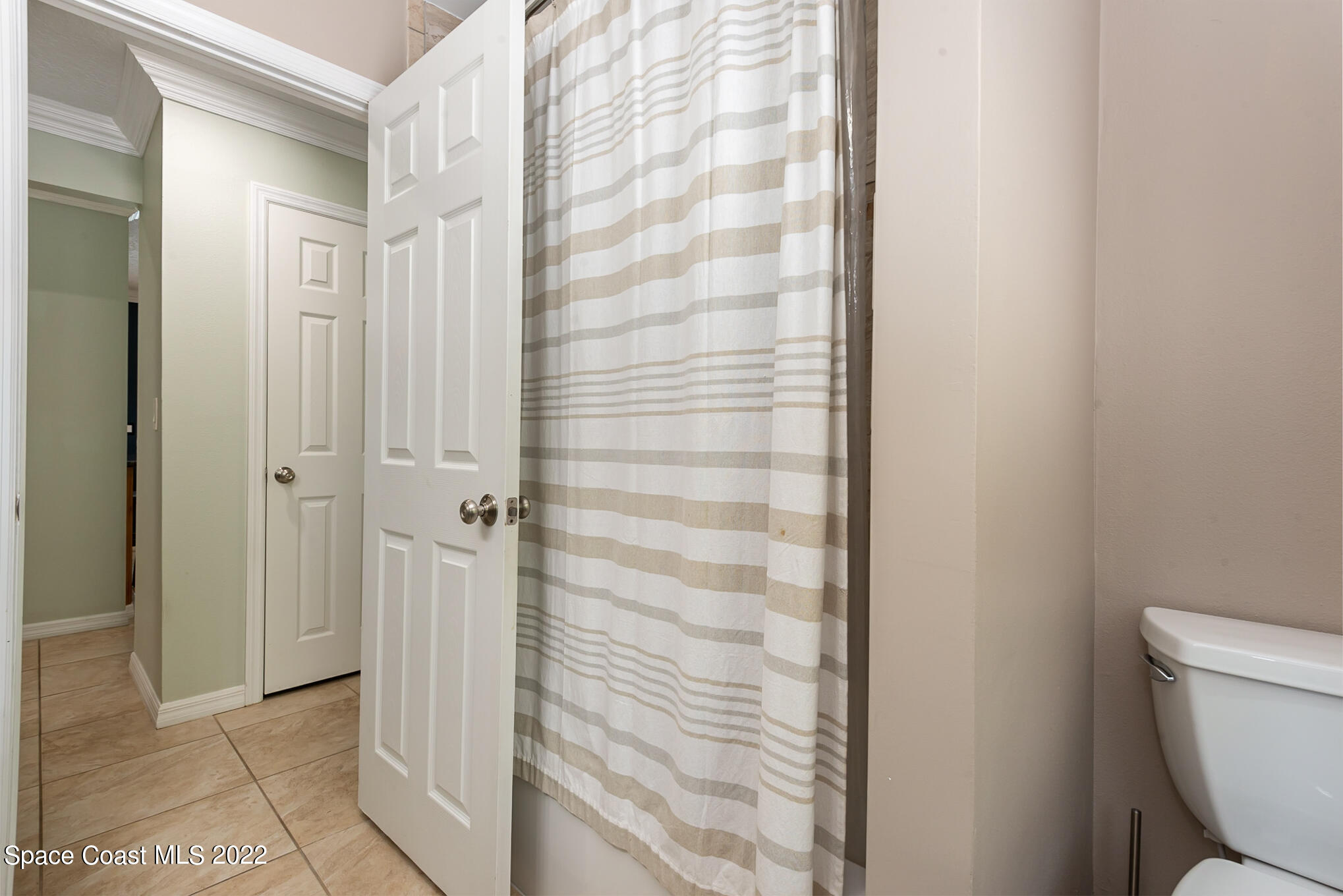 395 Rio Lane Indialantic, FL 32903 - Photo 33 of 40 a bathroom with a shower and a toilet