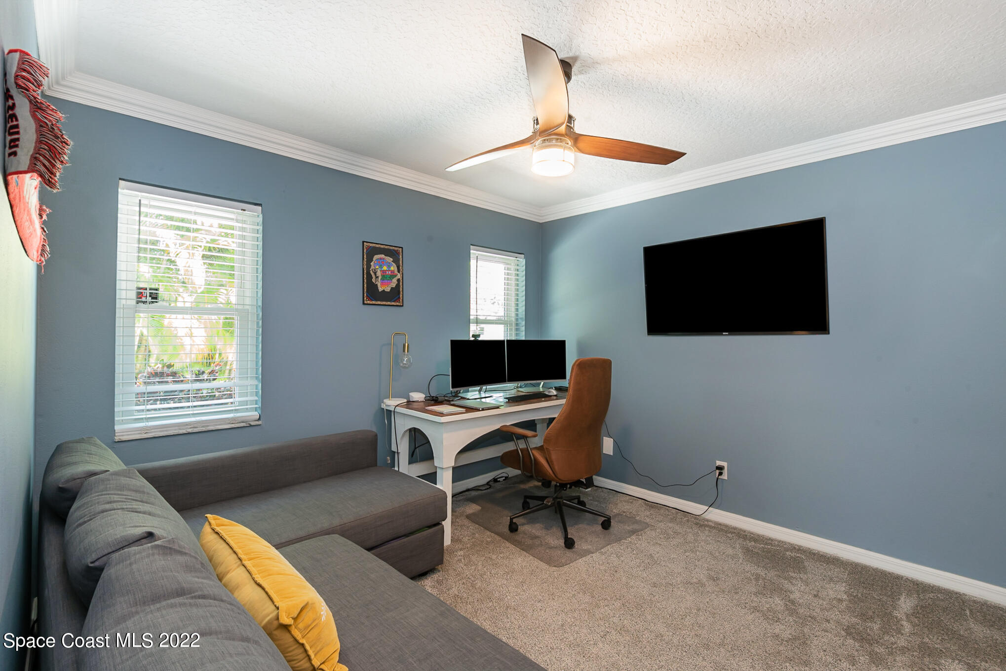 395 Rio Lane Indialantic, FL 32903 - Photo 35 of 40 a view of a livingroom with workspace and a window