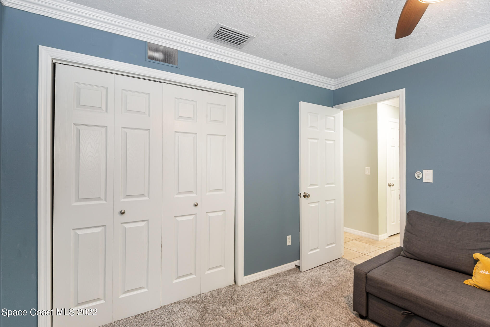 395 Rio Lane Indialantic, FL 32903 - Photo 36 of 40 a living room with furniture and a window