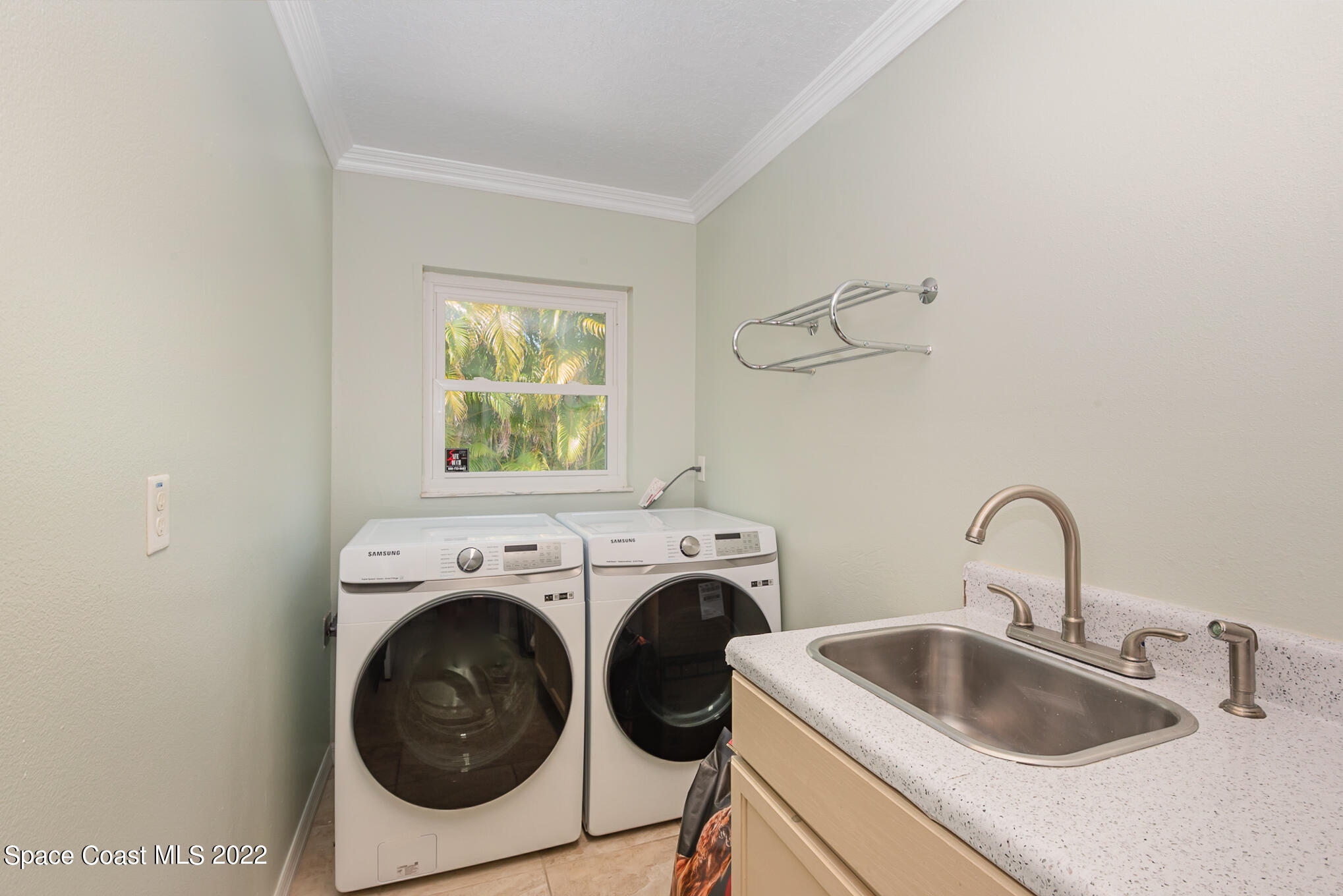 395 Rio Lane Indialantic, FL 32903 - Photo 37 of 40 a utility room with dryer and washer