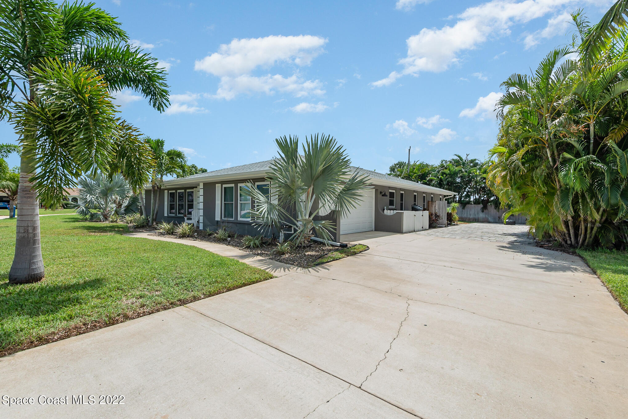 395 Rio Lane Indialantic, FL 32903 - Photo 6 of 40 a view of house with outdoor space and garden