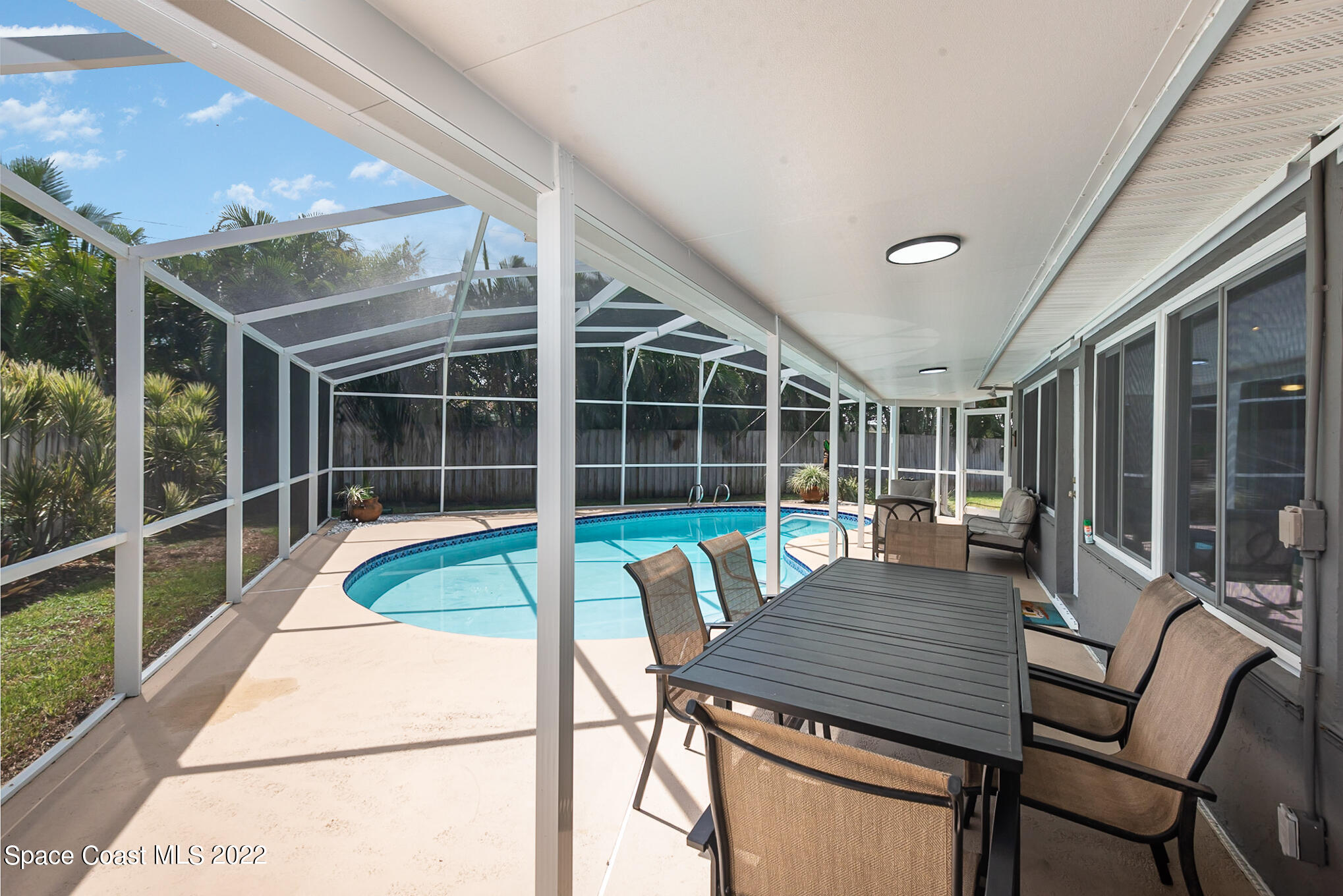 395 Rio Lane Indialantic, FL 32903 - Photo 10 of 40 a view of a house with a lounge chair