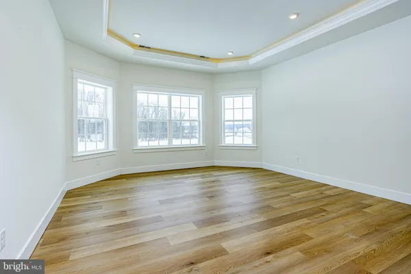a bathroom with a tub and shower