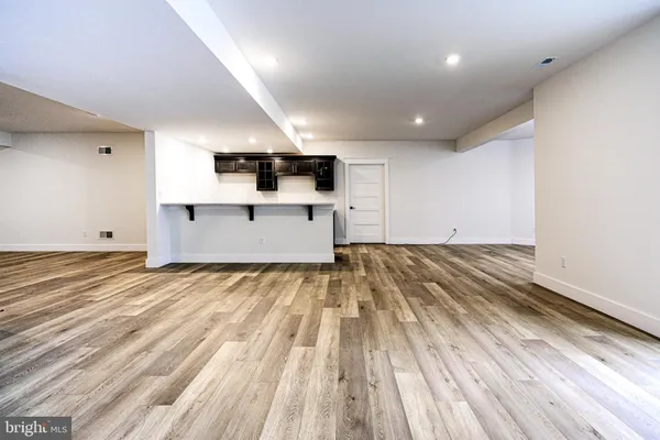 a view of a room with racks on the wall