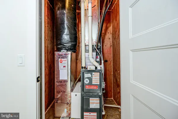 a front view of a building with a yard