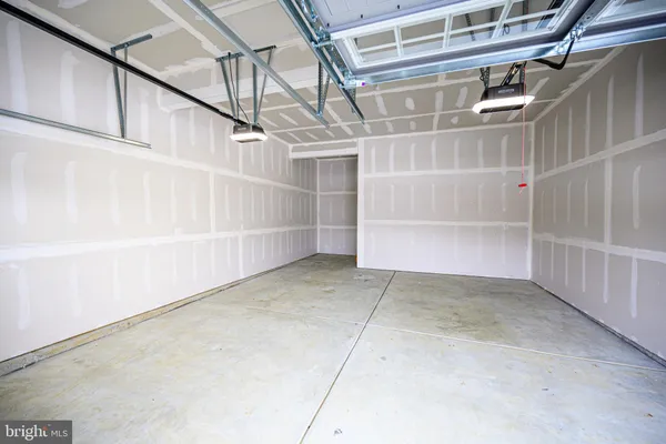 a view of a house with a snow in the background
