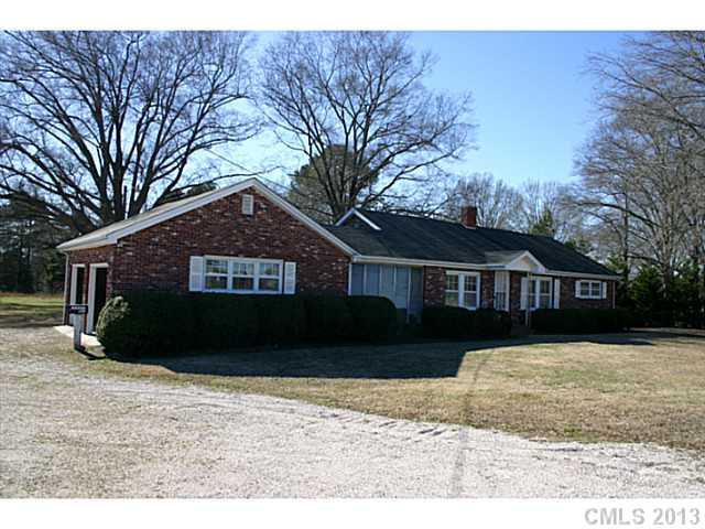 3396 Flat Creek Road Lancaster, SC 29720 - Photo 1 of 10 a front view of a house with a yard