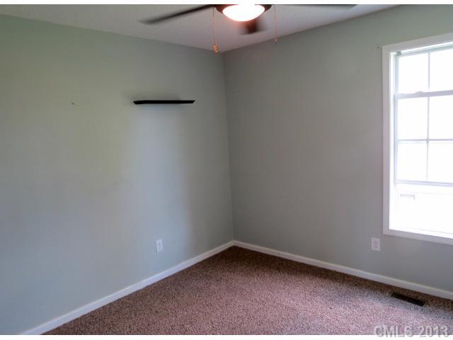 1015 Piney Church Road Concord, NC 28025 - Photo 11 of 13 an empty room with a window