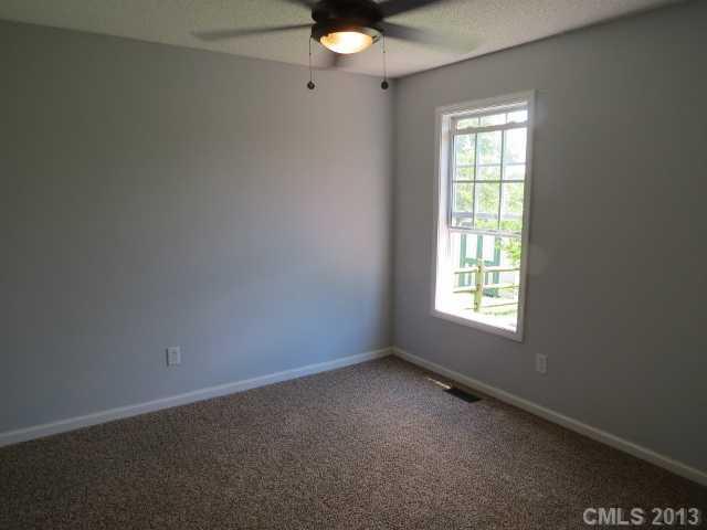 1015 Piney Church Road Concord, NC 28025 - Photo 12 of 13 an empty room with a window
