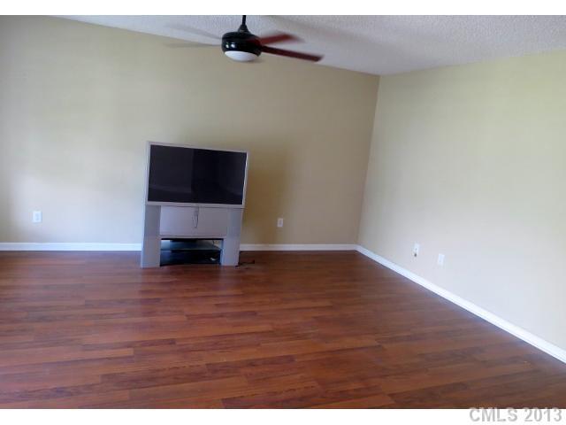 1015 Piney Church Road Concord, NC 28025 - Photo 3 of 13 a view of empty room with wooden floor