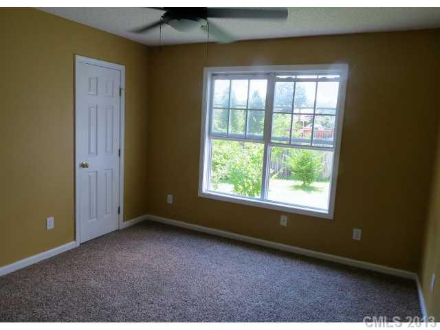 1015 Piney Church Road Concord, NC 28025 - Photo 9 of 13 an empty room with a window