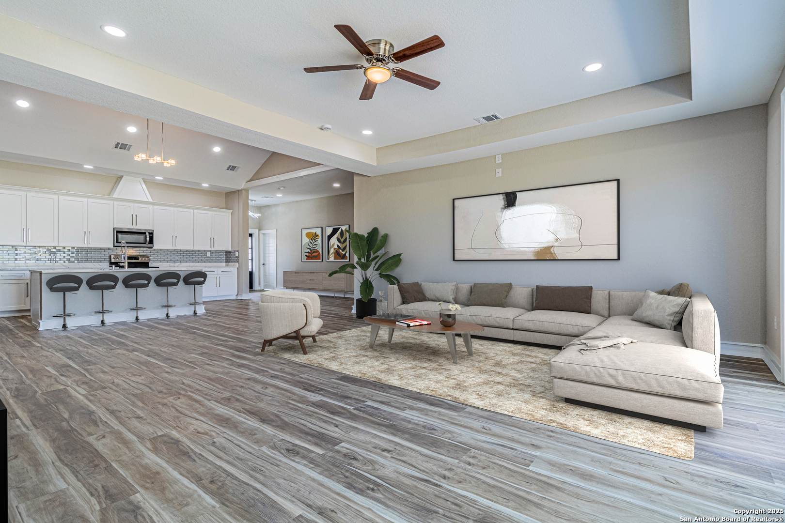 16923 Rancho Escondido Atascosa, TX 78002 - Photo 11 of 35 a living room with furniture and a wooden floor