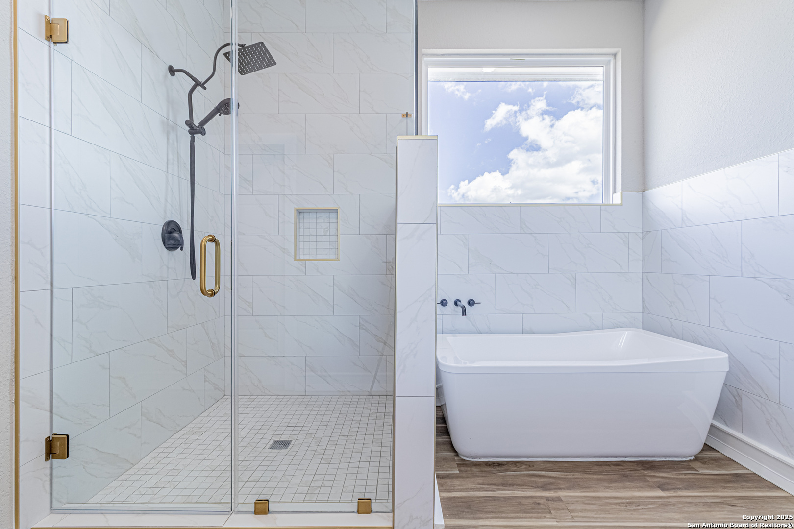 16923 Rancho Escondido Atascosa, TX 78002 - Photo 22 of 35 a white tub sitting next to a shower