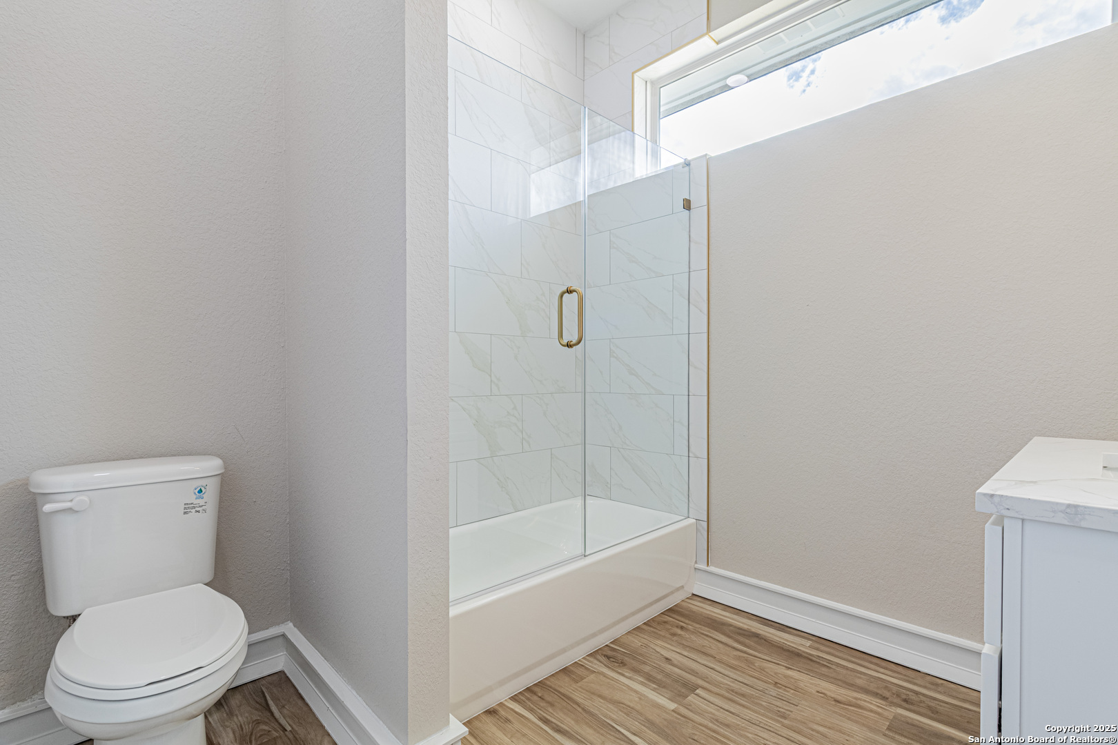 16923 Rancho Escondido Atascosa, TX 78002 - Photo 25 of 35 a bathroom with a toilet and a shower