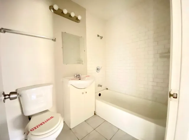 a bathroom with a sink and a toilet