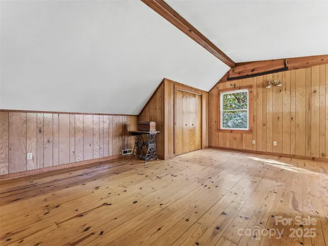 a view of an empty room with stairs