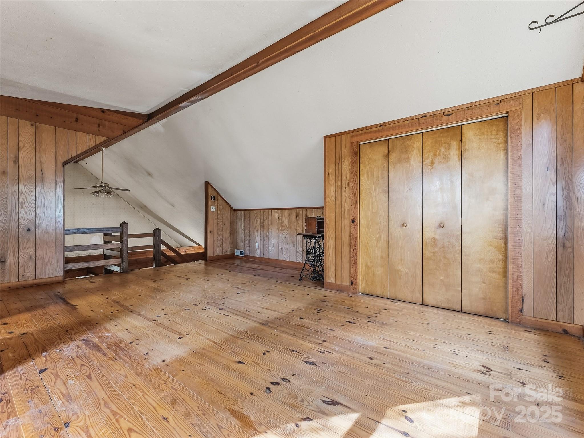 6130 Howard Gap Road Saluda, NC 28773 - Photo 14 of 27 a view of an empty room with stairs