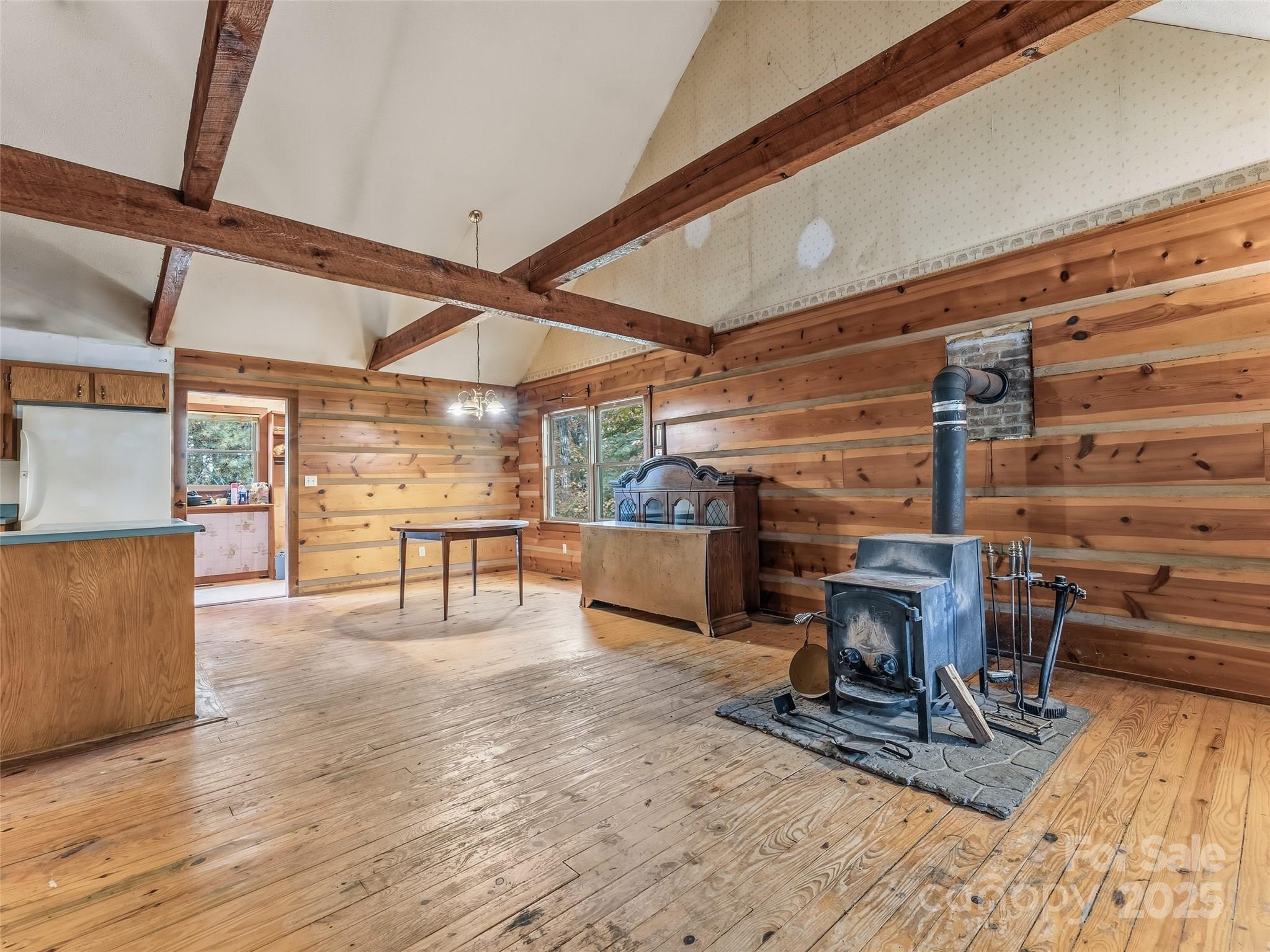 6130 Howard Gap Road Saluda, NC 28773 - Photo 4 of 27 a view of a room with wooden furniture