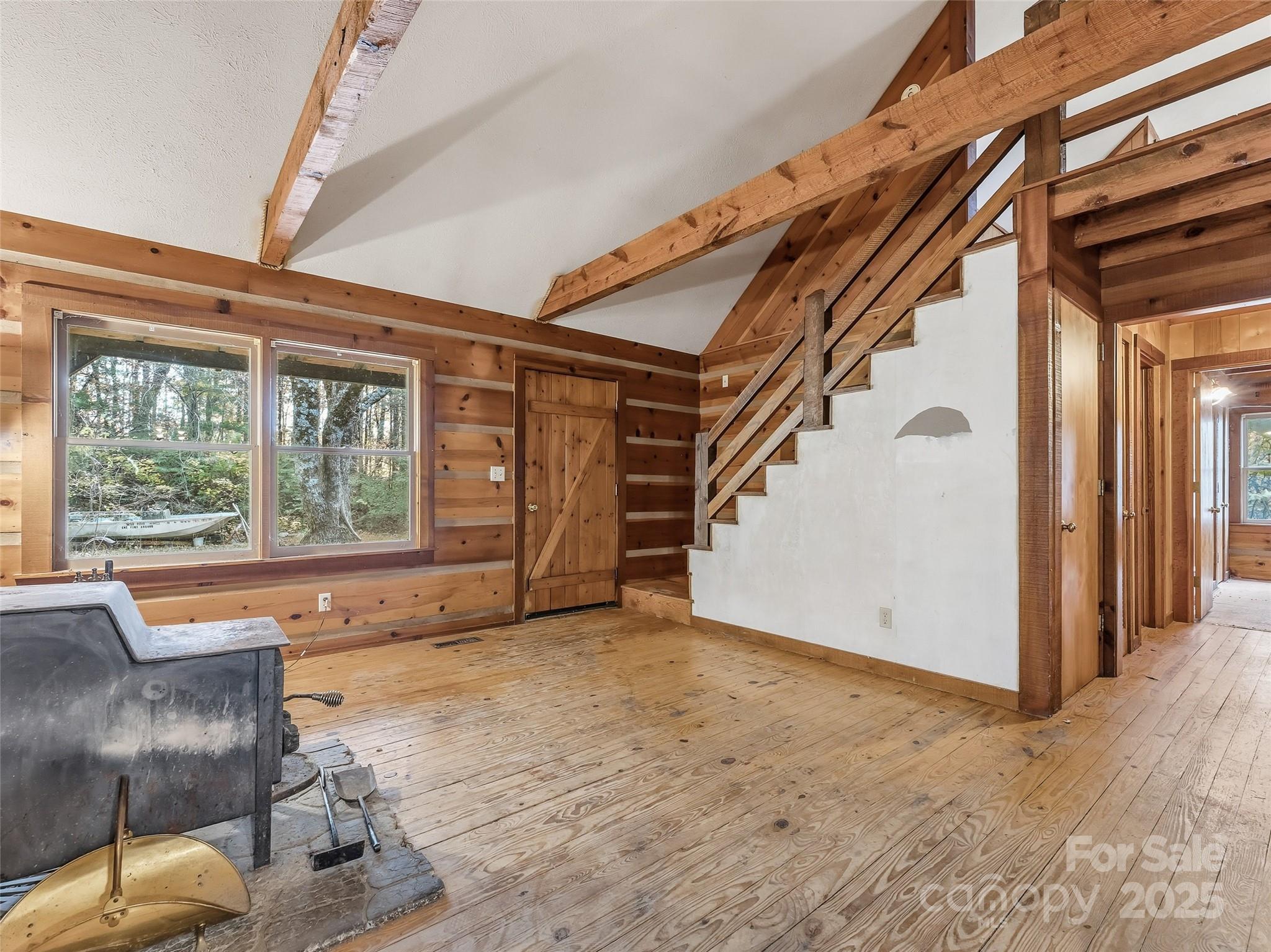 6130 Howard Gap Road Saluda, NC 28773 - Photo 7 of 27 a view of an entryway with staircase