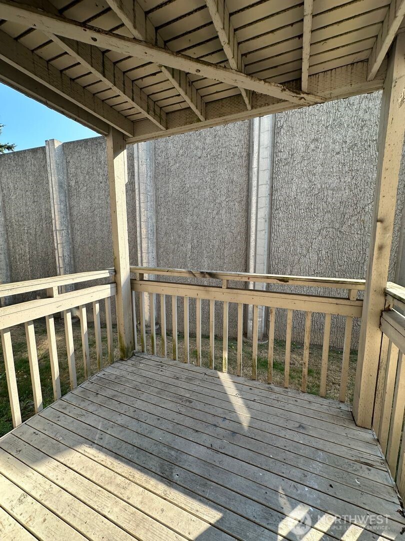 2515 Melvin Avenue, Unit C Everett, WA 98203 - Photo 7 of 13 a balcony with wooden floor