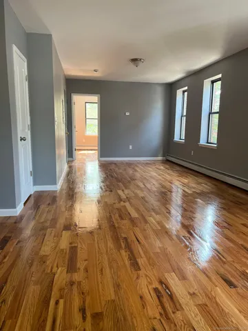 a view of an empty room and window