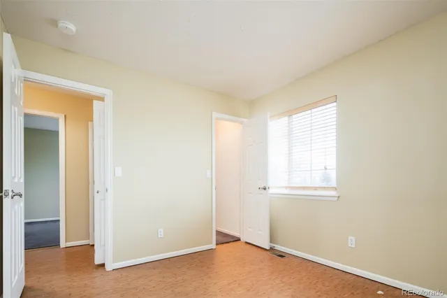 an empty room with windows