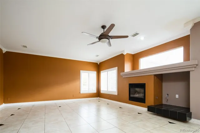 a view of livingroom and window with fireplace