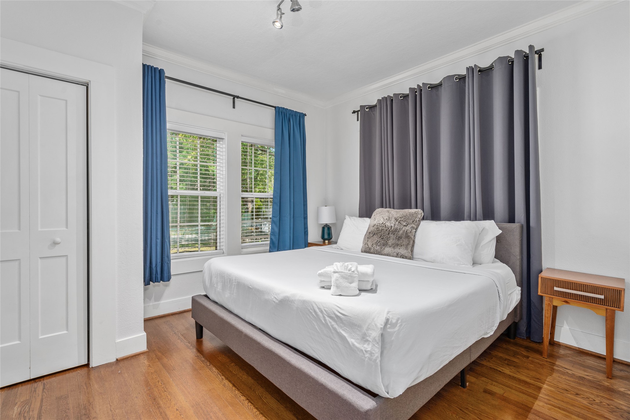 5302 Lindsay Street Houston, TX 77023 - Photo 11 of 37 a large white bed in a room next to a window