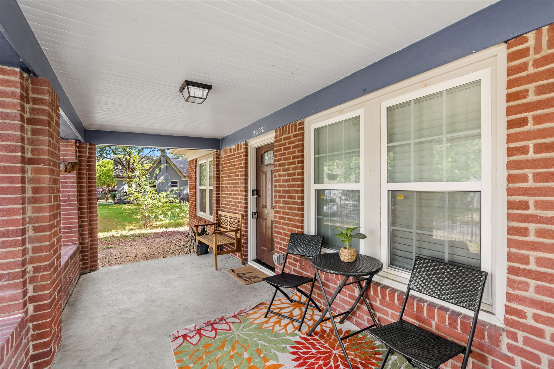 5302 Lindsay Street Houston, TX 77023 - Photo 2 of 37 a living room with furniture and a window