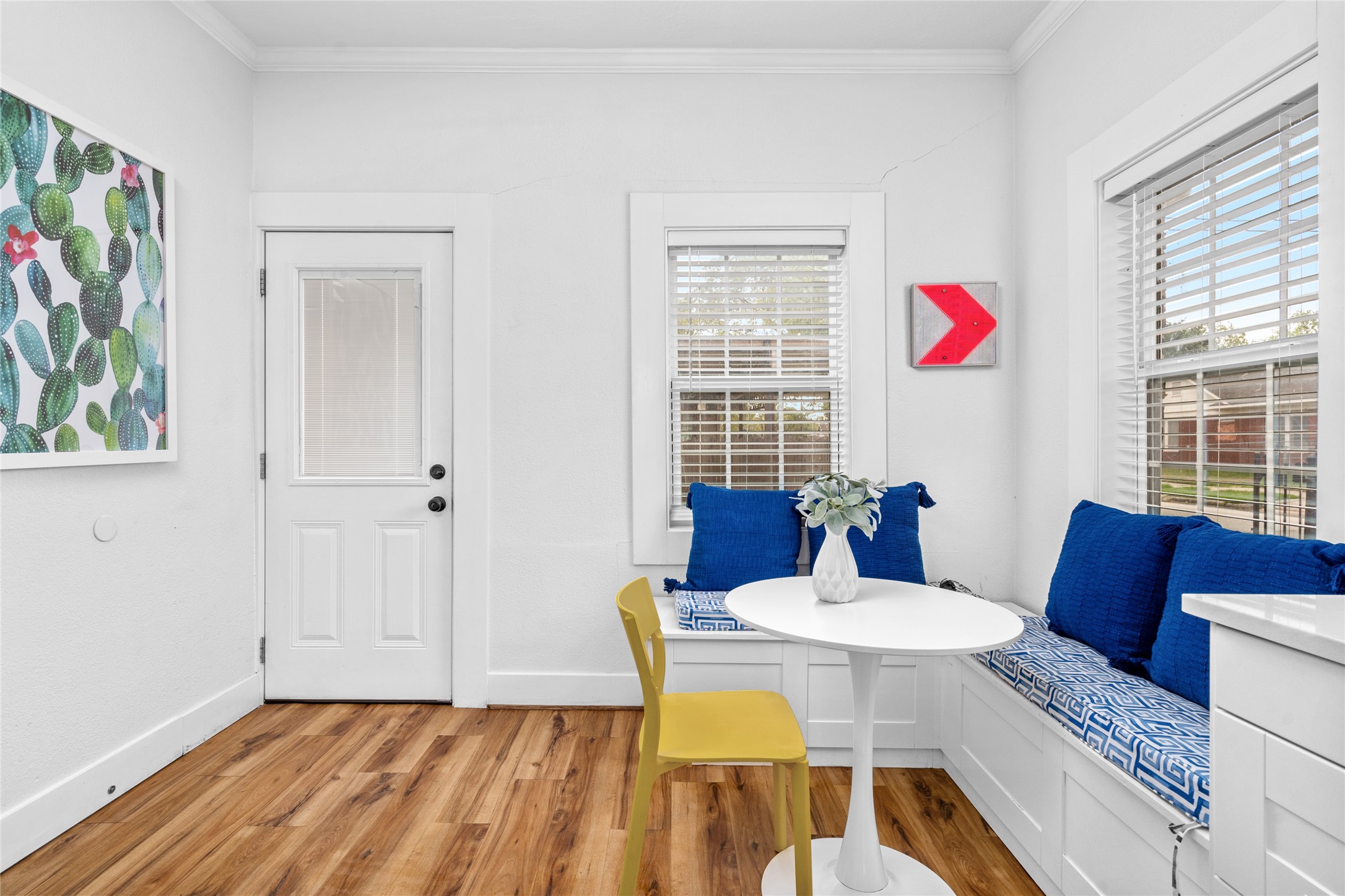 5302 Lindsay Street Houston, TX 77023 - Photo 9 of 37 a view of a dining room with furniture window and wooden floor