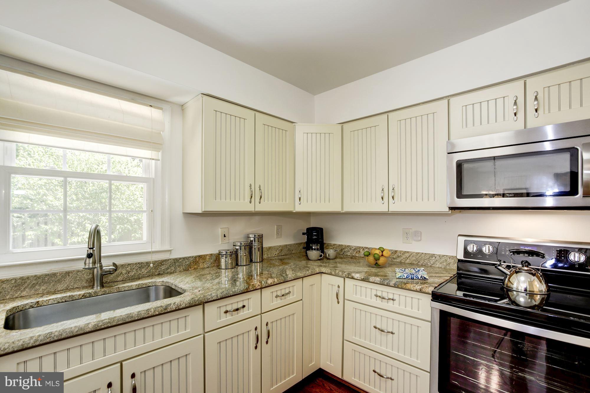 7401 Spring Tree Drive Springfield, VA 22153 - Photo 3 of 28 Solid Wood Cream Cabinets