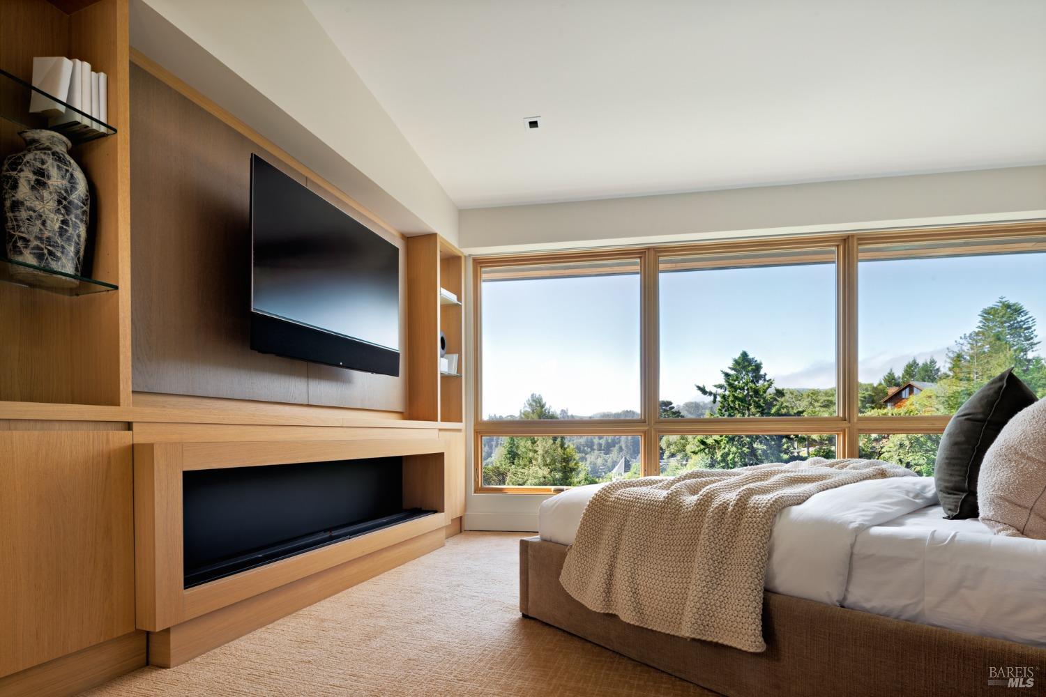 2 Upper Alcatraz Place Mill Valley, CA 94941 - Photo 17 of 42 a bedroom with a bed and a flat screen tv