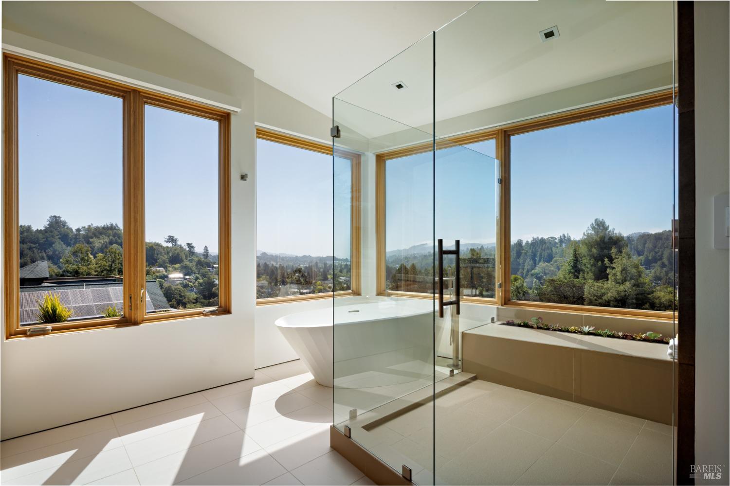 2 Upper Alcatraz Place Mill Valley, CA 94941 - Photo 19 of 42 a living room with a large window and table
