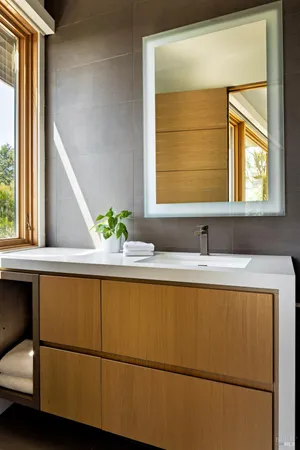 a bathroom with a bathtub and a sink