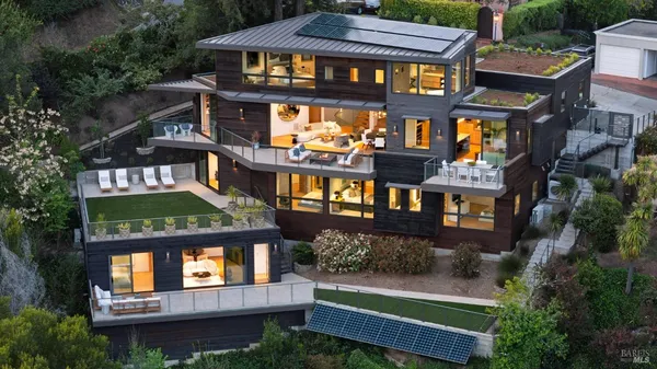 a front view of a building with garden