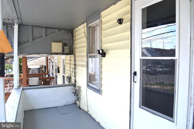 a view of living room with a large window