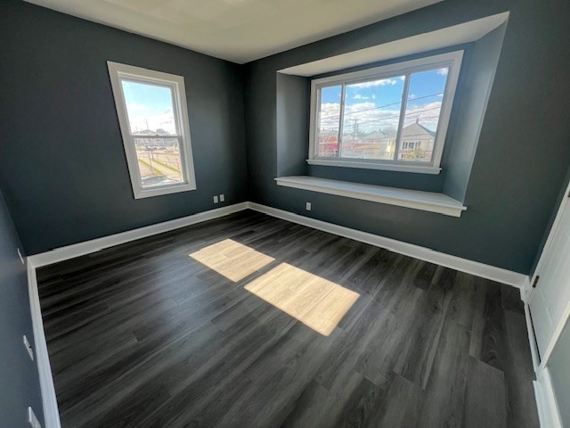 1414 Plymouth Avenue, Unit 2 Fall River, MA 02721 - Photo 7 of 7 a view of empty room with wooden floor and fan
