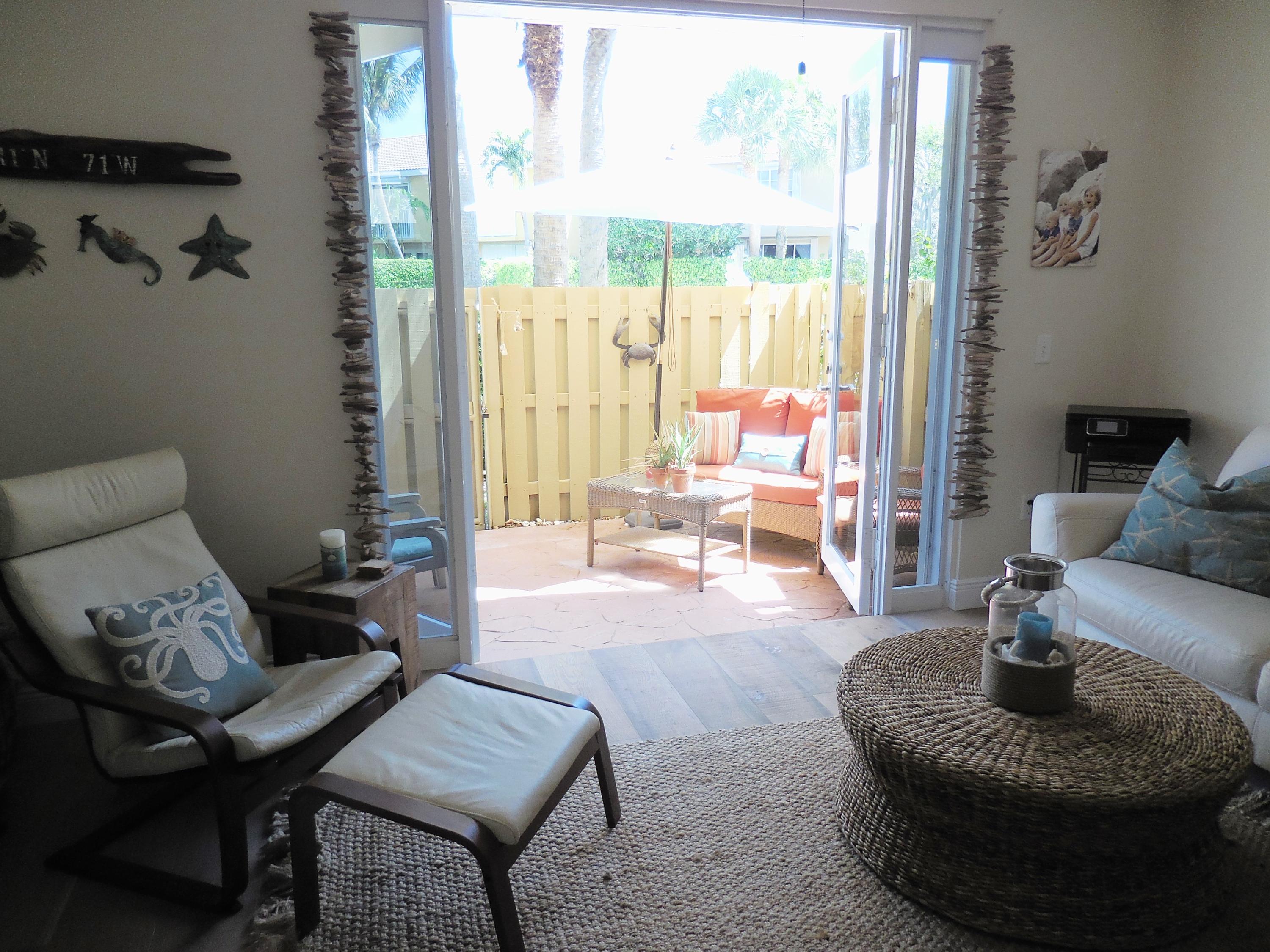1002 Jeffery Street Boca Raton, FL 33487 - Photo 11 of 42 Living room to patio