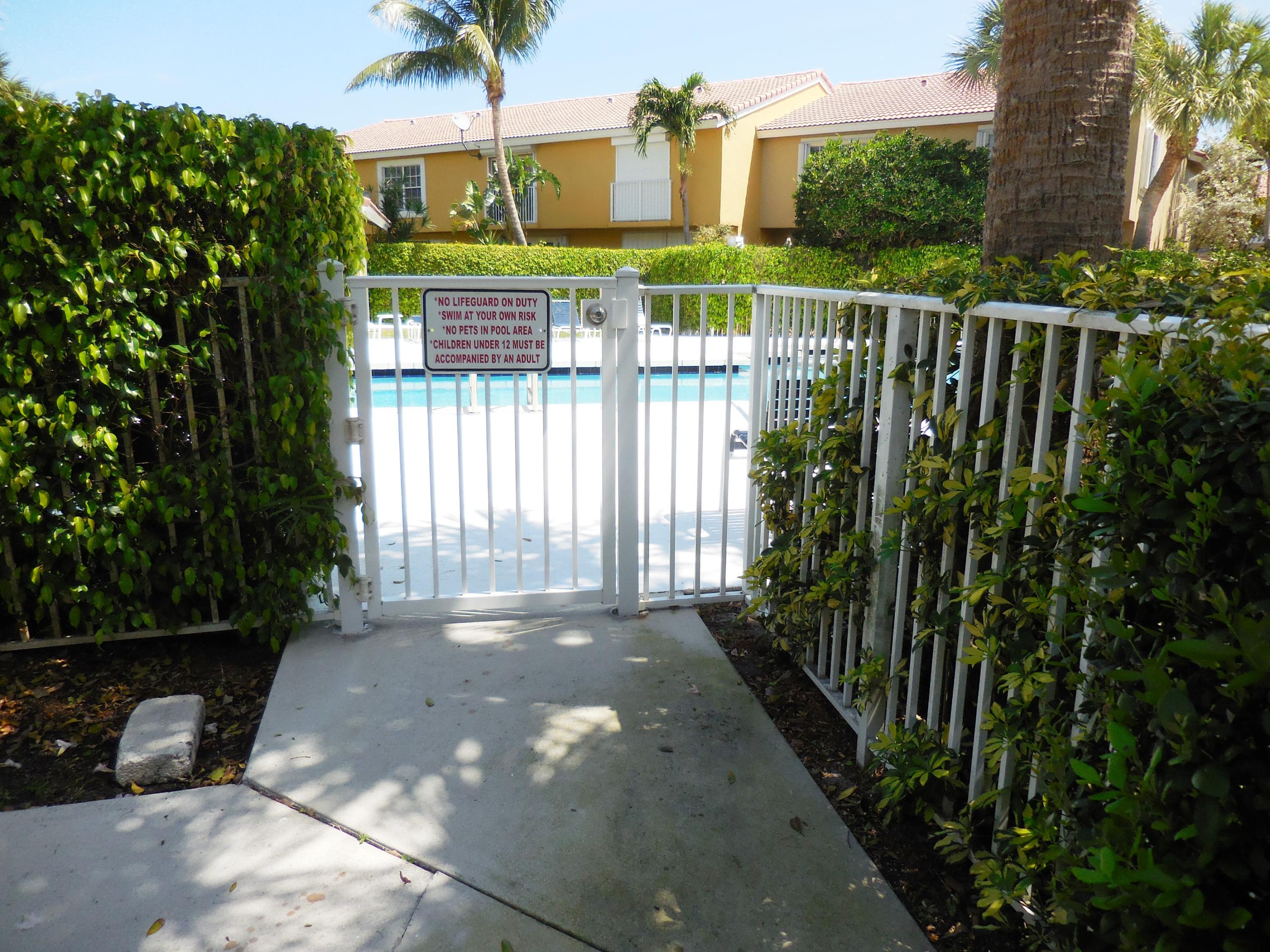 1002 Jeffery Street Boca Raton, FL 33487 - Photo 16 of 42 Entrance to pool